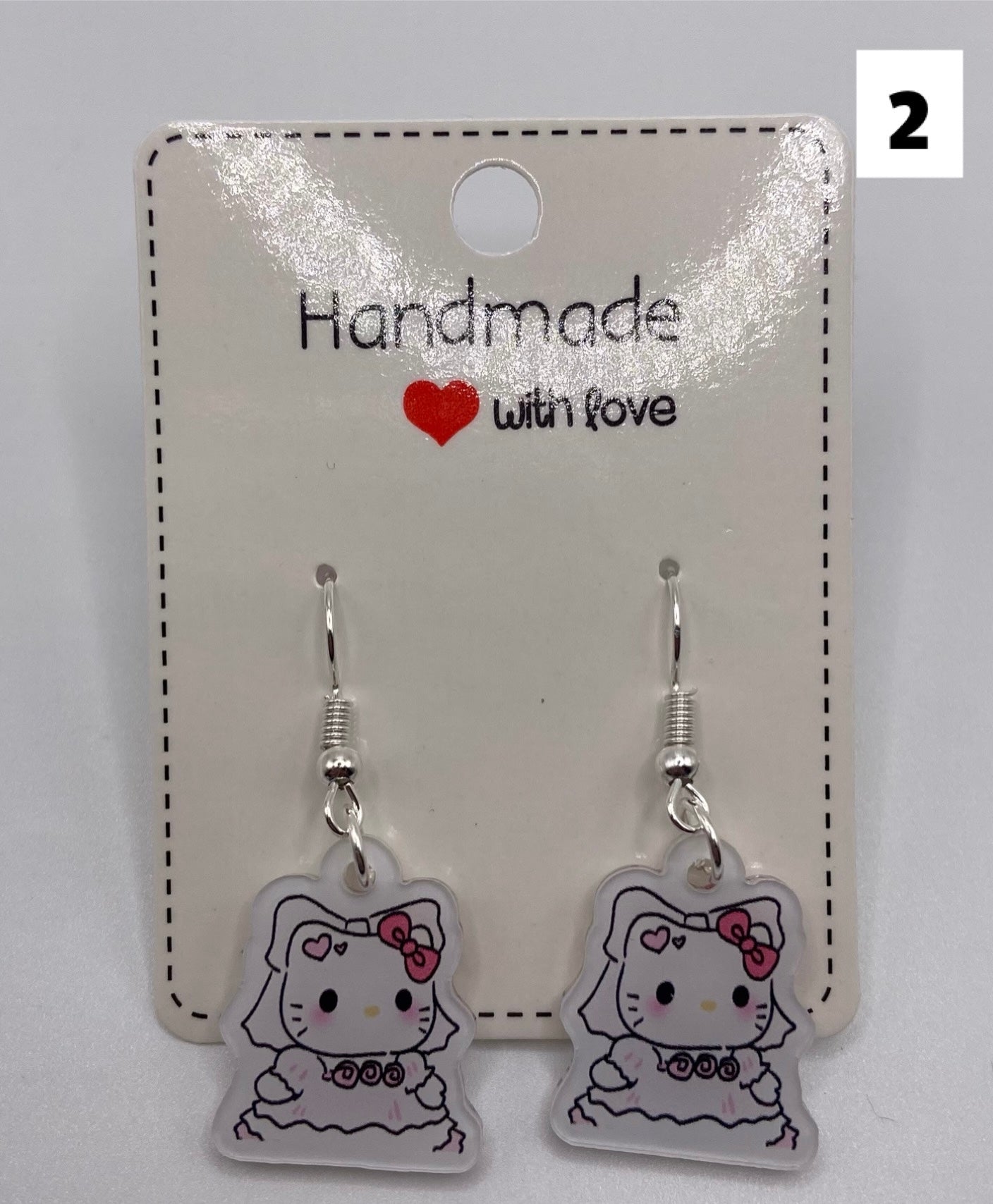 H K Dangle Earrings